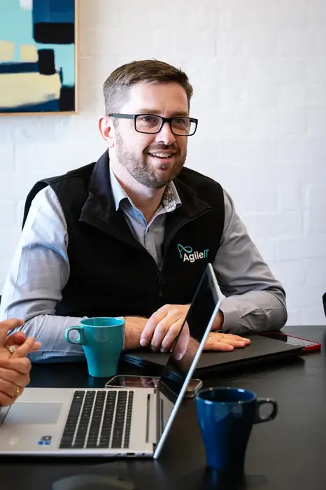 Agile IT consultant meeting with an eastern Melbourne client