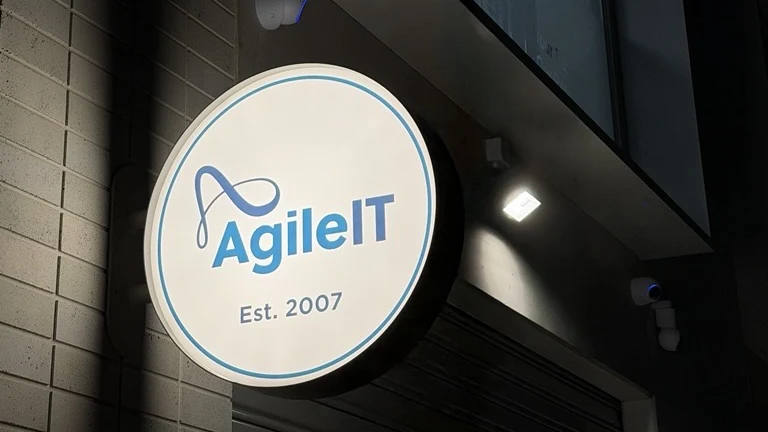 The illuminated Agile IT sign, established 2007, at the entrance to our Mornington office