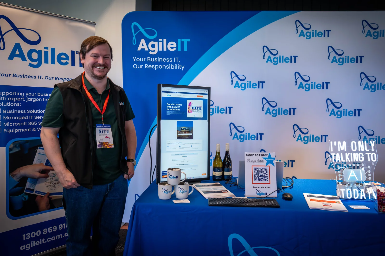 Liam, Senior Solutions Consultant, at the Agile IT stand at the B.I.T.E Business Conference 2026, beside the AI and cyber security readiness check the team ran on the day.