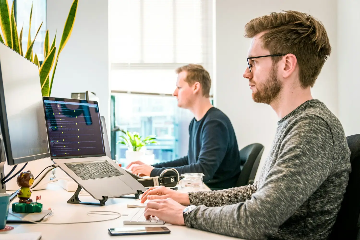 A person reviewing file access and permissions on a laptop before rolling out Microsoft 365 Copilot.