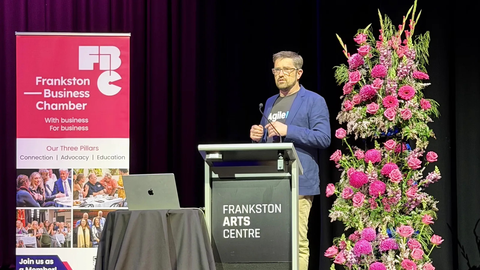 Linden Jackson presenting The Good, The Bad and The Bot in the main theatre at the Frankston Arts Centre.
