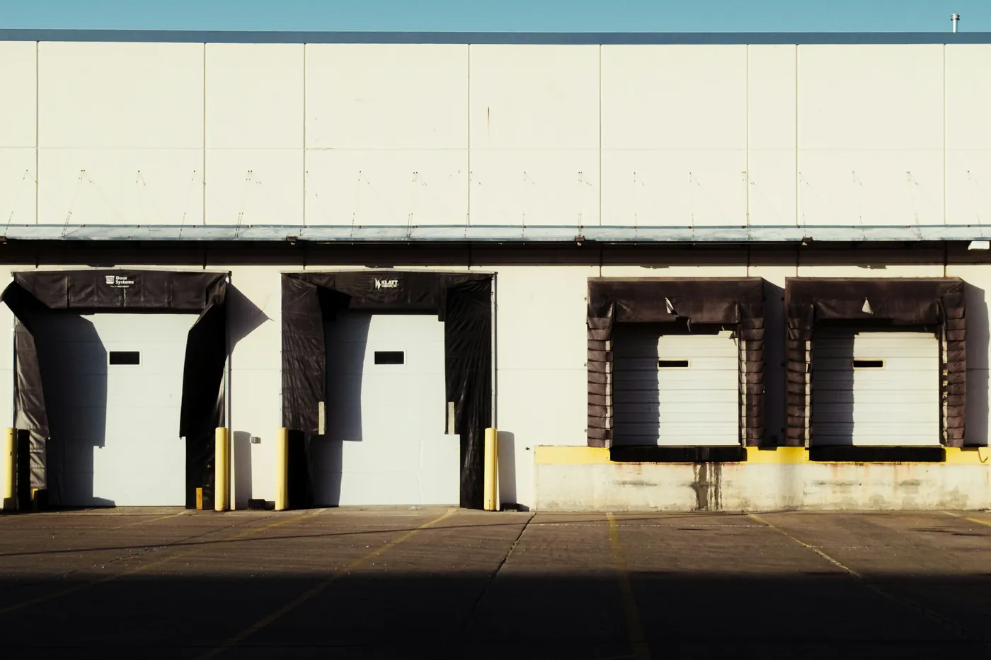 A row of loading docks along a distribution building
