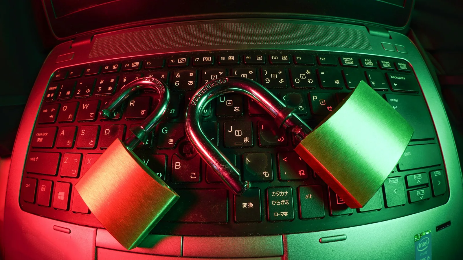 A close-up of a metal lock and chain, representing the simple physical security habit of locking your computer when you walk away. Photo by FlyD on Unsplash.