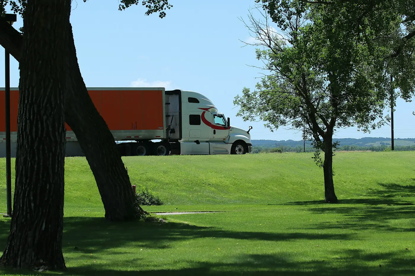 A semi-trailer travelling on an open road